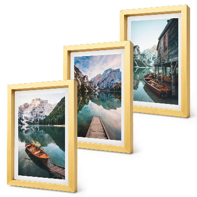 Triptych v ráme Jazero v horách s loďkami a drevenou chatrčou