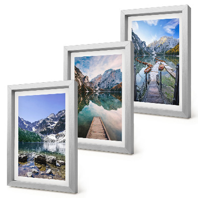 Triptych v ráme Hory, jazerá a drevené móla nad vodou