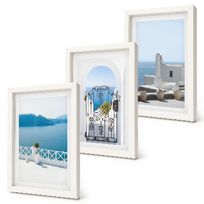 Triptych v ráme Výhľady na more s bielymi budovami v Grécku