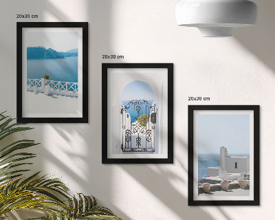 Triptych v ráme Výhľady na more s bielymi budovami v Grécku