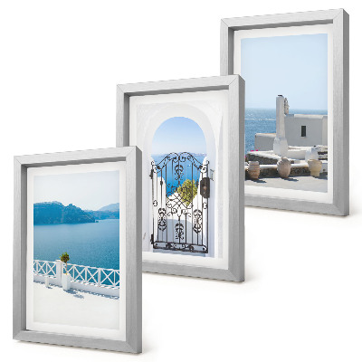 Triptych v ráme Výhľady na more s bielymi budovami v Grécku