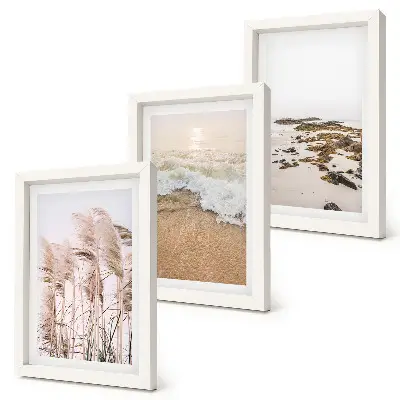 Vlny plážovej trávy a kamene pri mori v štýle boho triptych v ráme