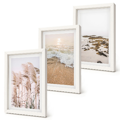 Triptych v ráme Vlny plážovej trávy a kamene pri mori v štýle boho