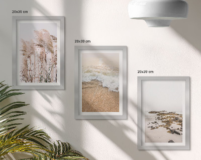 Triptych v ráme Vlny plážovej trávy a kamene pri mori v štýle boho