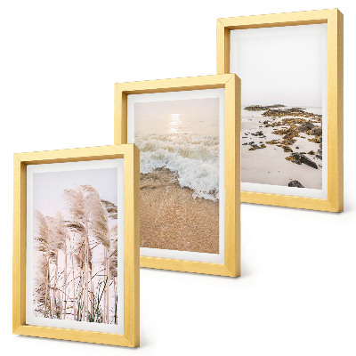 Triptych v ráme Vlny plážovej trávy a kamene pri mori v štýle boho