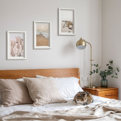 Triptych v ráme Vlny plážovej trávy a kamene pri mori v štýle boho
