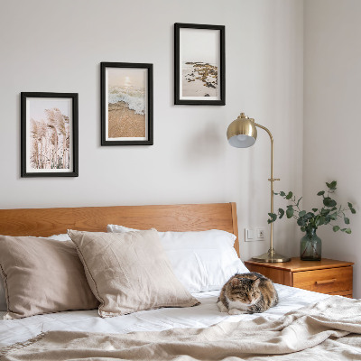 Triptych v ráme Vlny plážovej trávy a kamene pri mori v štýle boho