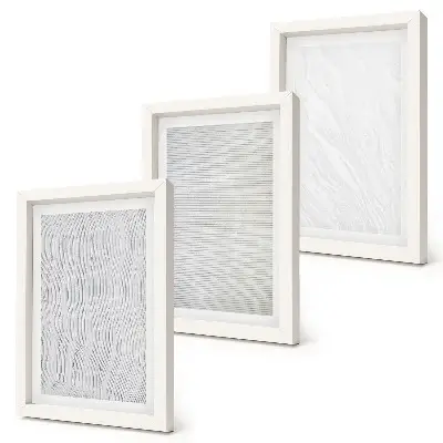 Jasné vzory štruktúr strún v piesku triptych v ráme