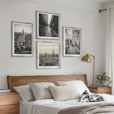 Zarámovaný set obrazov výhľady na Paríž a New York so schodiskom